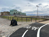 Active travel route Greenock harbours with Beacon Arts Centre and Custom House in background.